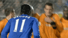 a soccer player with the number 11 on his jersey
