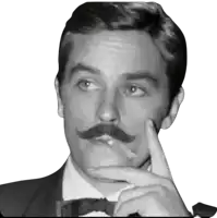 a black and white photo of a man with a mustache and bow tie