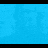 a close up of a man 's face in blue