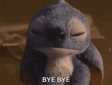 a stuffed animal with big eyes is sitting down and says `` bye bye '' .