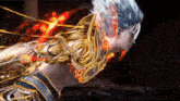 a close up of a person 's face with fire coming out of it 's mouth .