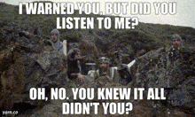 a group of knights are hiding in a cave with a caption that says i warned you but did you listen to me