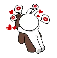 a brown teddy bear with a butterfly on its head