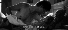 a man and a woman are laying in bed and the man is kissing the woman .
