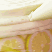 a close up of a cake with the words mr.cakes on the bottom right