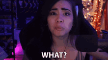 a woman in a gaming chair says what