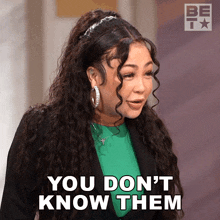 a woman says you don 't know them while wearing a green shirt