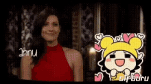 a woman in a red dress is smiling next to a cartoon character with hearts on her head