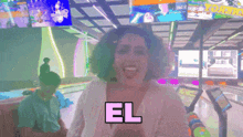 a woman in a bowling alley says el