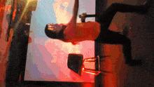 a woman stands in front of a projection screen that says baby got my body