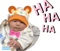 a baby wearing a hat and a bow tie is surrounded by the words ha ha ha ha