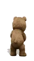 a teddy bear is holding a shaker and dancing