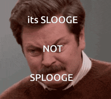 a man with a mustache has the words " its slooge not splooge " written on his face