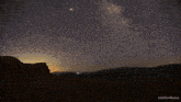 a night sky with dvdfilmbonus written on the bottom left