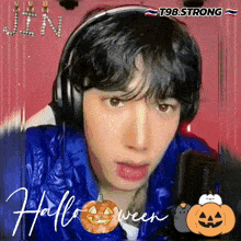 a young man wearing headphones and a blue jacket says jin halloween