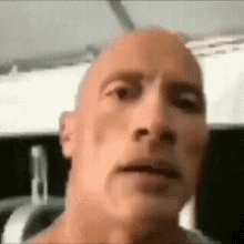 a close up of a man 's face with a blurry background