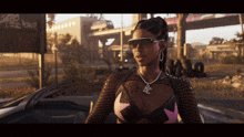 a woman wearing sunglasses and a necklace with the letters bc on it