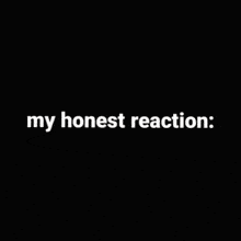 a man is covering his face with his hand and the words `` my honest reaction '' written above him .