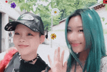 two girls with green hair are standing next to each other in front of a camera that says rec