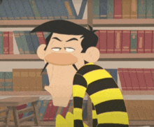 a cartoon character in a yellow and black striped shirt is sitting in front of a bookshelf