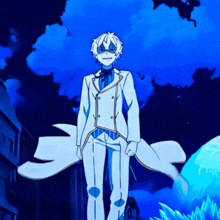 a man in a white suit and tie is standing in front of a blue sky