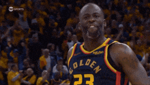 a basketball player wearing a jersey with the number 23 on it