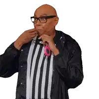 a bald man wearing glasses and a striped shirt is holding a pink donut in his mouth