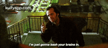 a man is giving the middle finger and saying i 'm just gonna bash your brains in .
