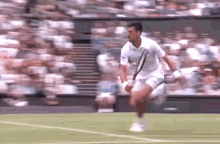 Novak Djokovic Slide GIF - Novak Djokovic Slide Tennis GIFs