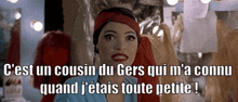 a woman in a dressing room with the words c est un cousin du gers