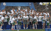 a group of soccer players wearing shirts with the number 13