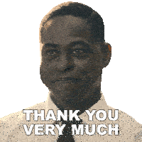 a man in a white shirt and tie is smiling and says thank you very much