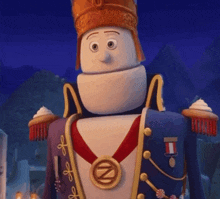 a nutcracker with a medal around his neck that says ' n ' on it