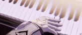 a person playing a piano with a puzzle piece on the keyboard