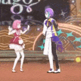 a man and a girl are dancing together on a stage .