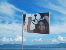 a flag with a picture of a man and a dog with the letter k on it