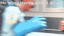 a person wearing blue gloves is cleaning a sink with the words me when having a heat attack on the bottom