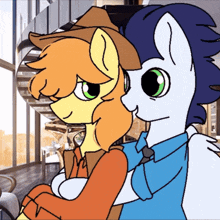 a couple of ponies are hugging each other in a room