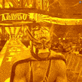 a man in a mask stands in front of a sign that says el grande americano 0