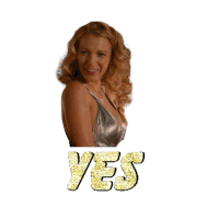 a woman in a silver dress is smiling and the word yes is behind her