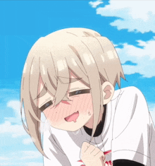 a girl with short blonde hair is wearing a white shirt that says ' tokyo ' on the front