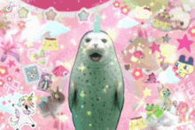 a seal with a unicorn horn is standing in front of a pink background with stickers .