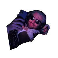 a man wearing sunglasses and headphones is taking a picture of himself