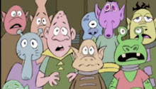 a group of cartoon characters are standing next to each other looking scared