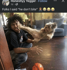 a picture of a man kicking a dog with the caption " folks i said he do n't bite "
