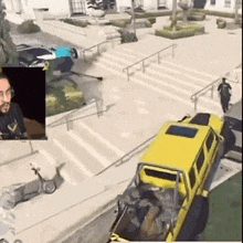 a yellow truck is parked on the side of the road next to a skateboard ramp .
