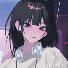a girl with black hair and headphones around her neck is smiling