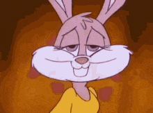 a close up of a cartoon rabbit wearing a yellow shirt and making a sad face .