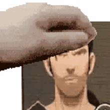 a hand is putting a hat on a man 's head in a pixel art .