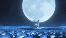 a woman stands in a field of blue flowers in front of a full moon